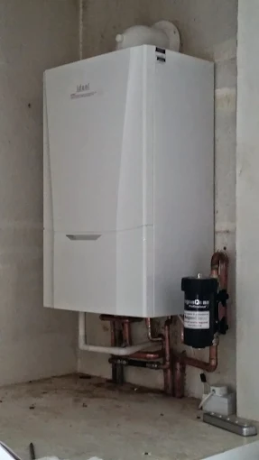 Plumbing pipework and magnetic filter installation by 24hr Electrical Services